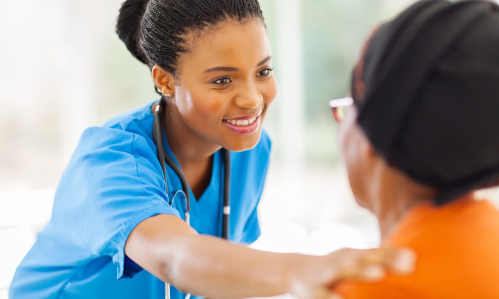 nurse comforting a patient