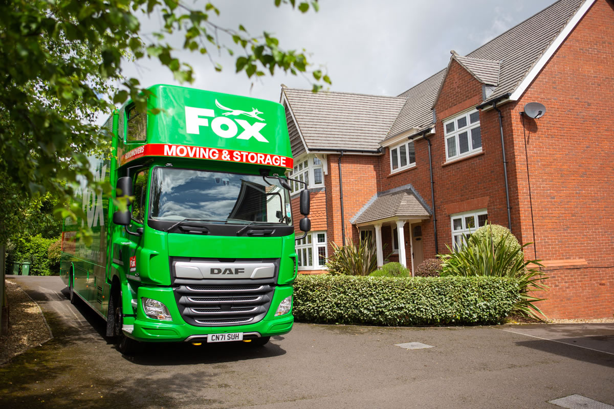 fox moving and storage van outside a property