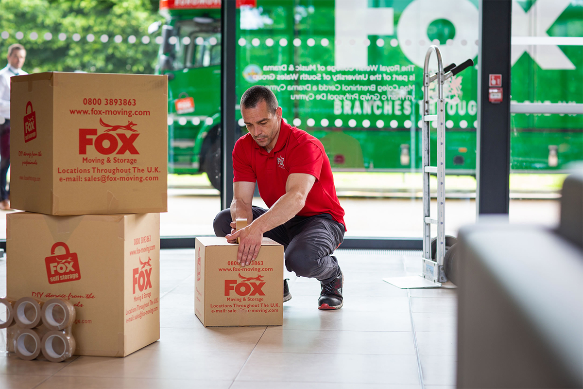 fox removals expert packing up items for moving