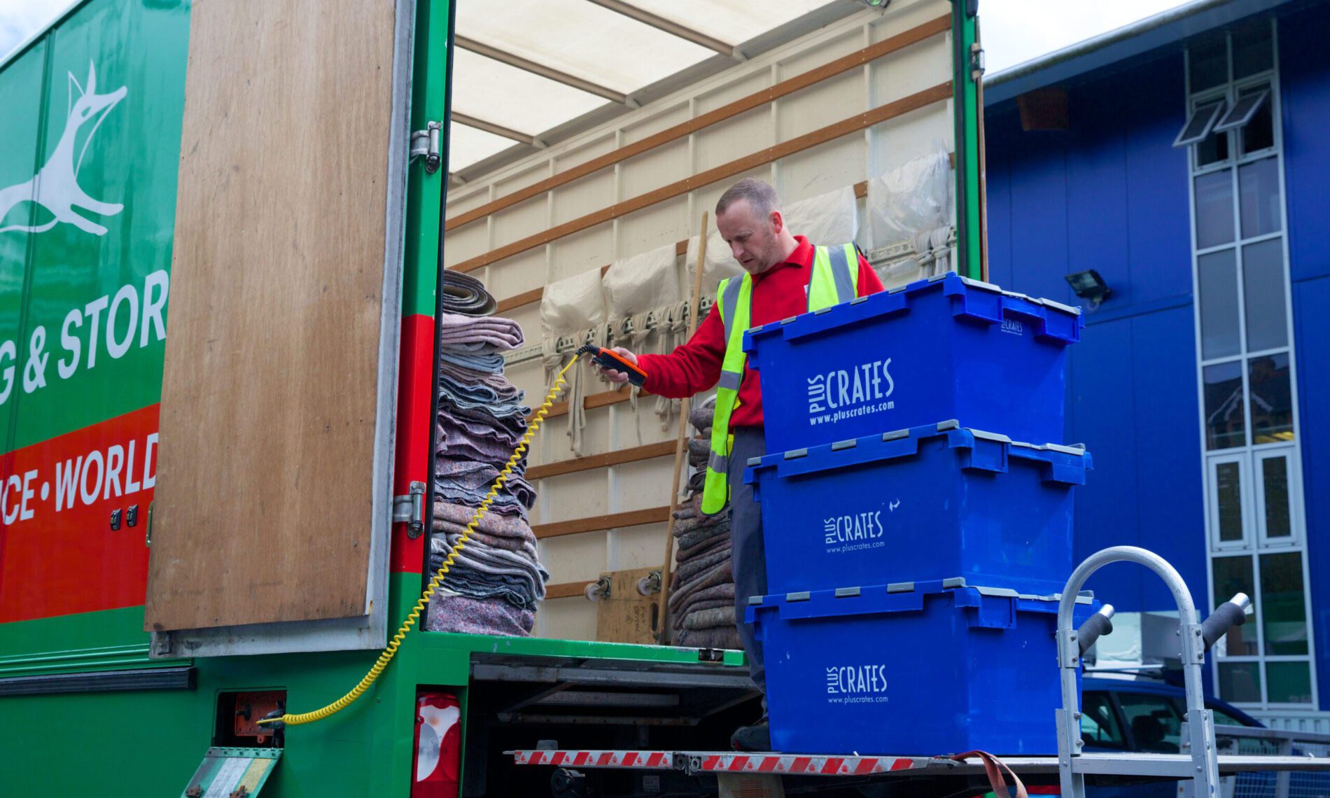 loading crates onto a fox moving van