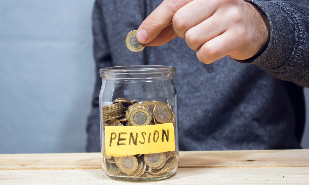 someone putting money into a pension pot